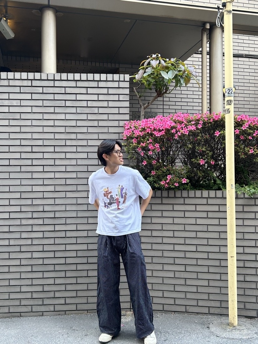 Standing by the flowers in Tokyo